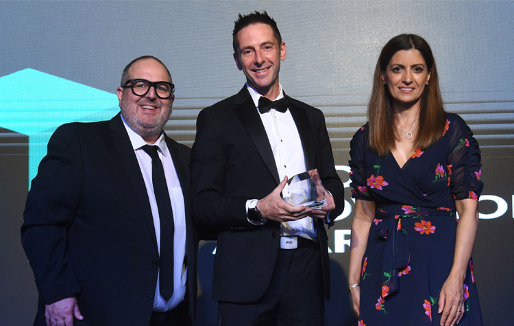 Jason Whittall with the Building Innovation award